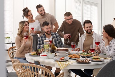 Photo of Group of people having brunch together indoors