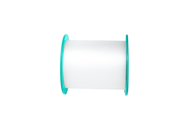 Photo of Medical sticking plaster roll isolated on white. First aid item