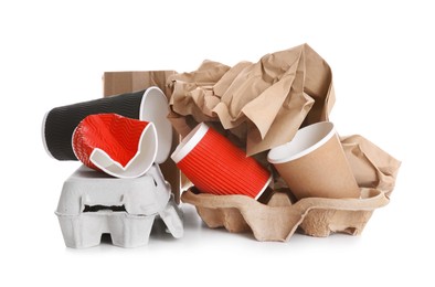 Photo of Pile of cardboard garbage on white background. Recycling rubbish