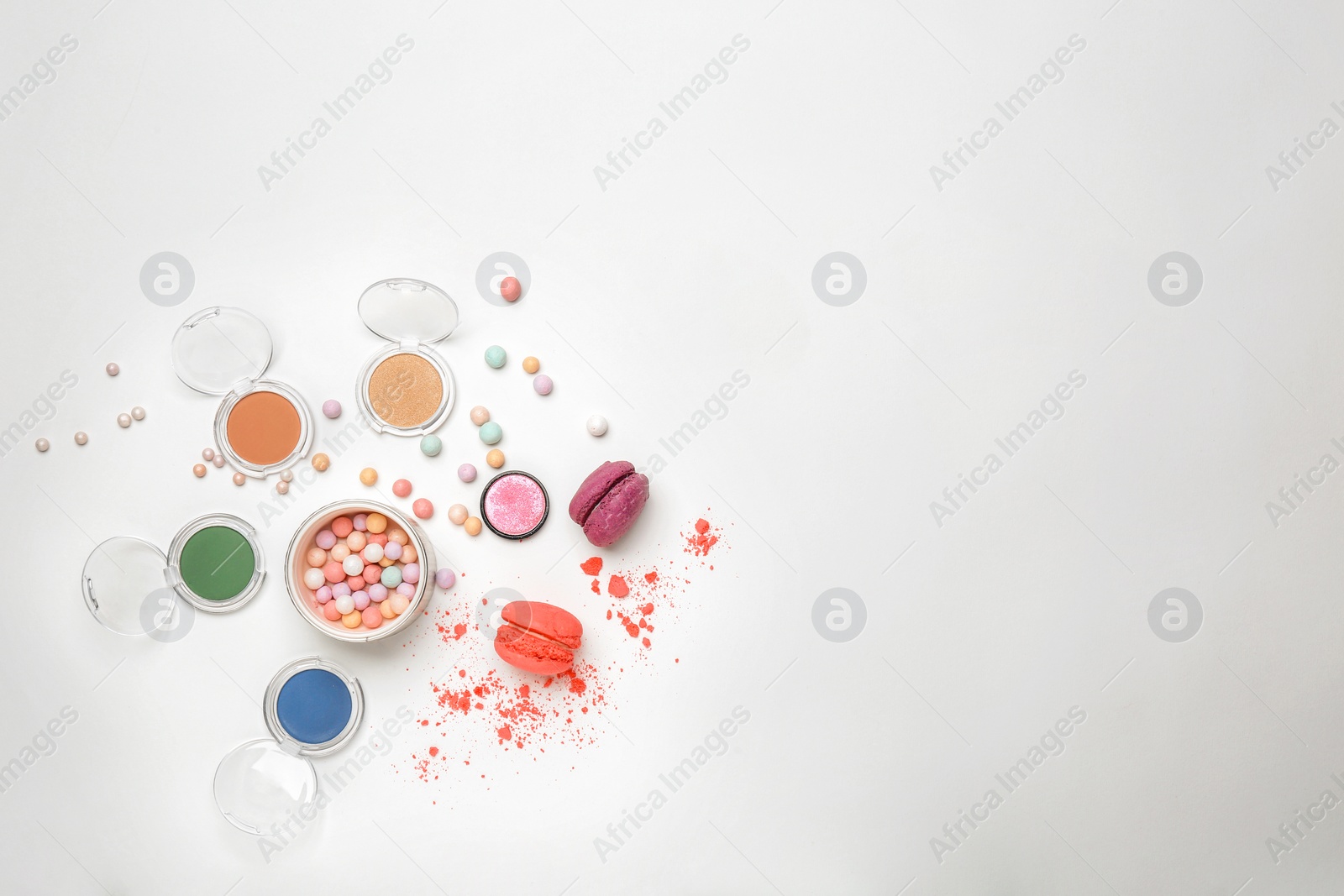 Photo of Decorative makeup products on white background