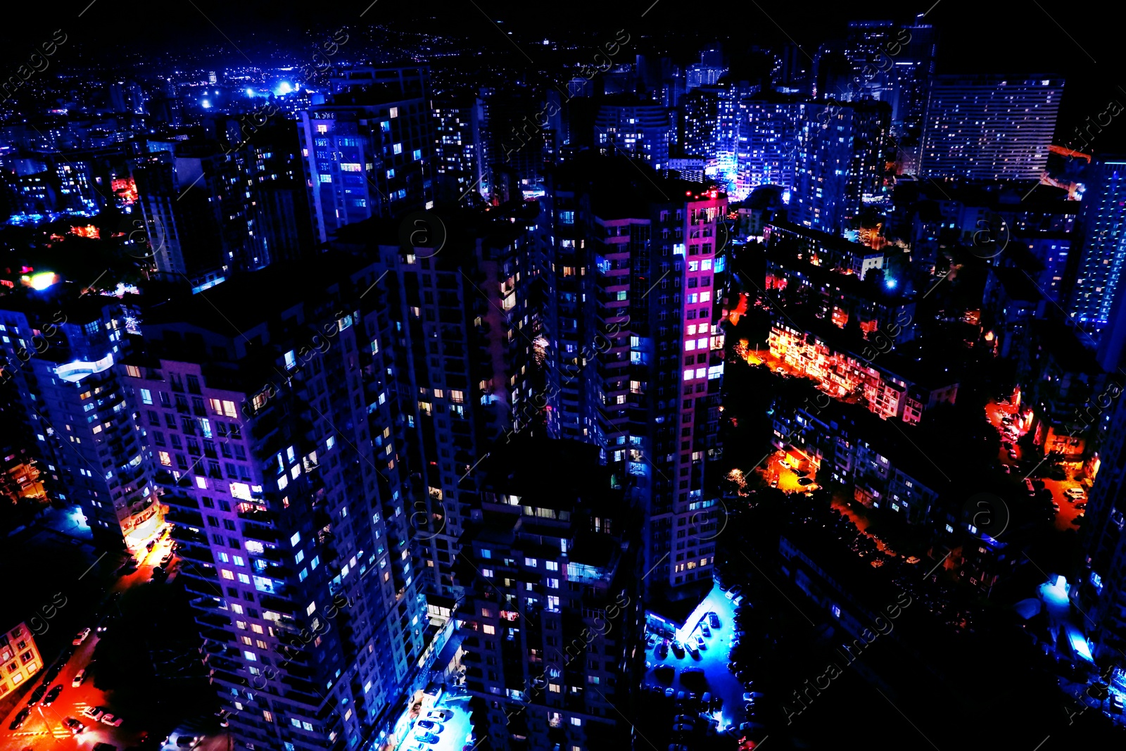 Image of Dark cityscape with beautiful neon lights. Modern metropolis