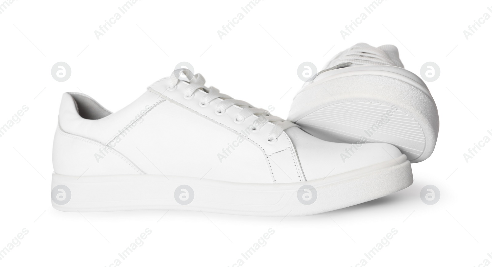 Photo of Pair of stylish sneakers isolated on white