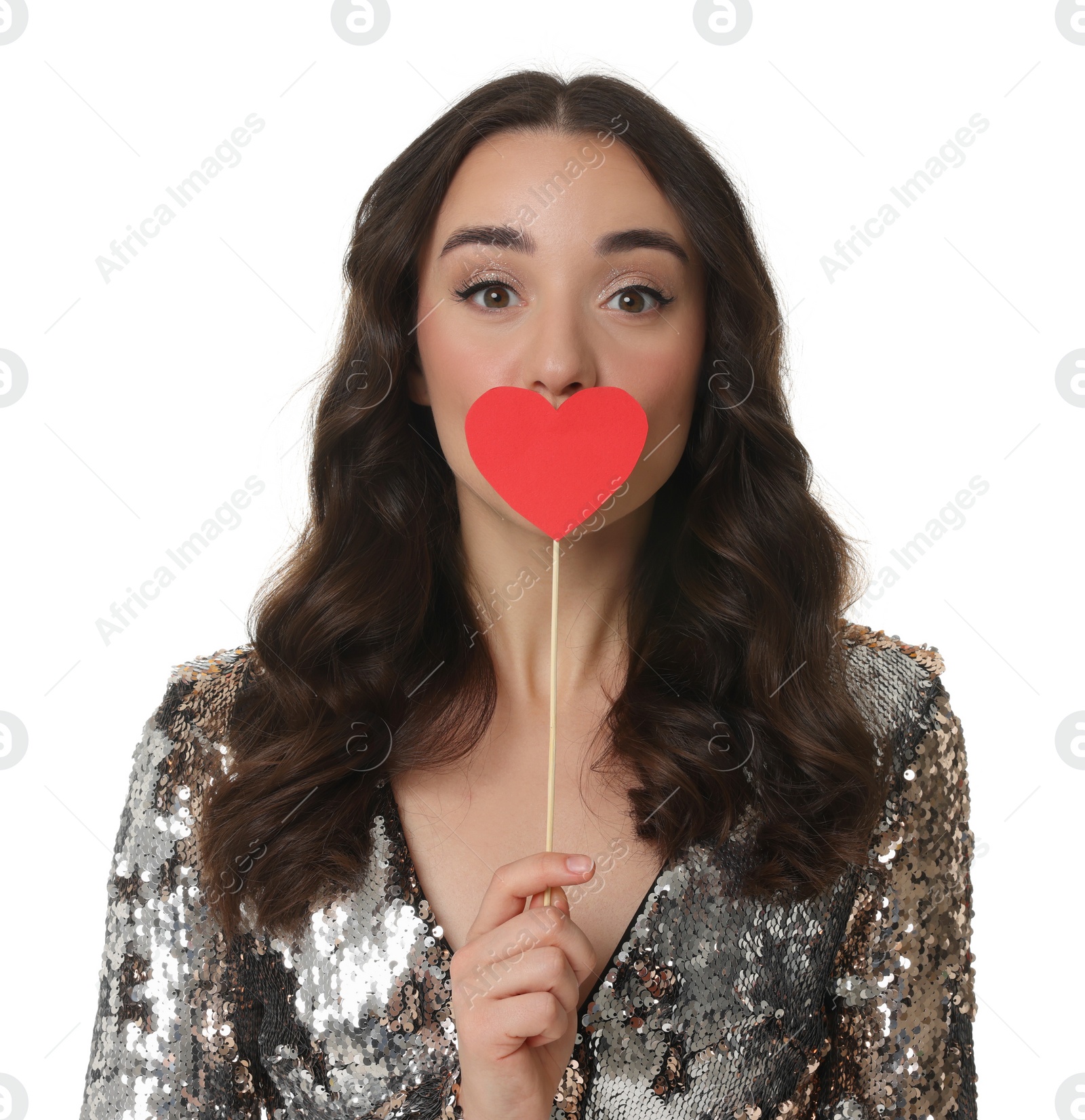 Photo of Beautiful young woman covering her mouth with paper heart isolated on white