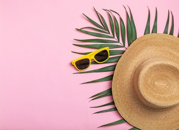 Flat lay composition with beach objects on color background