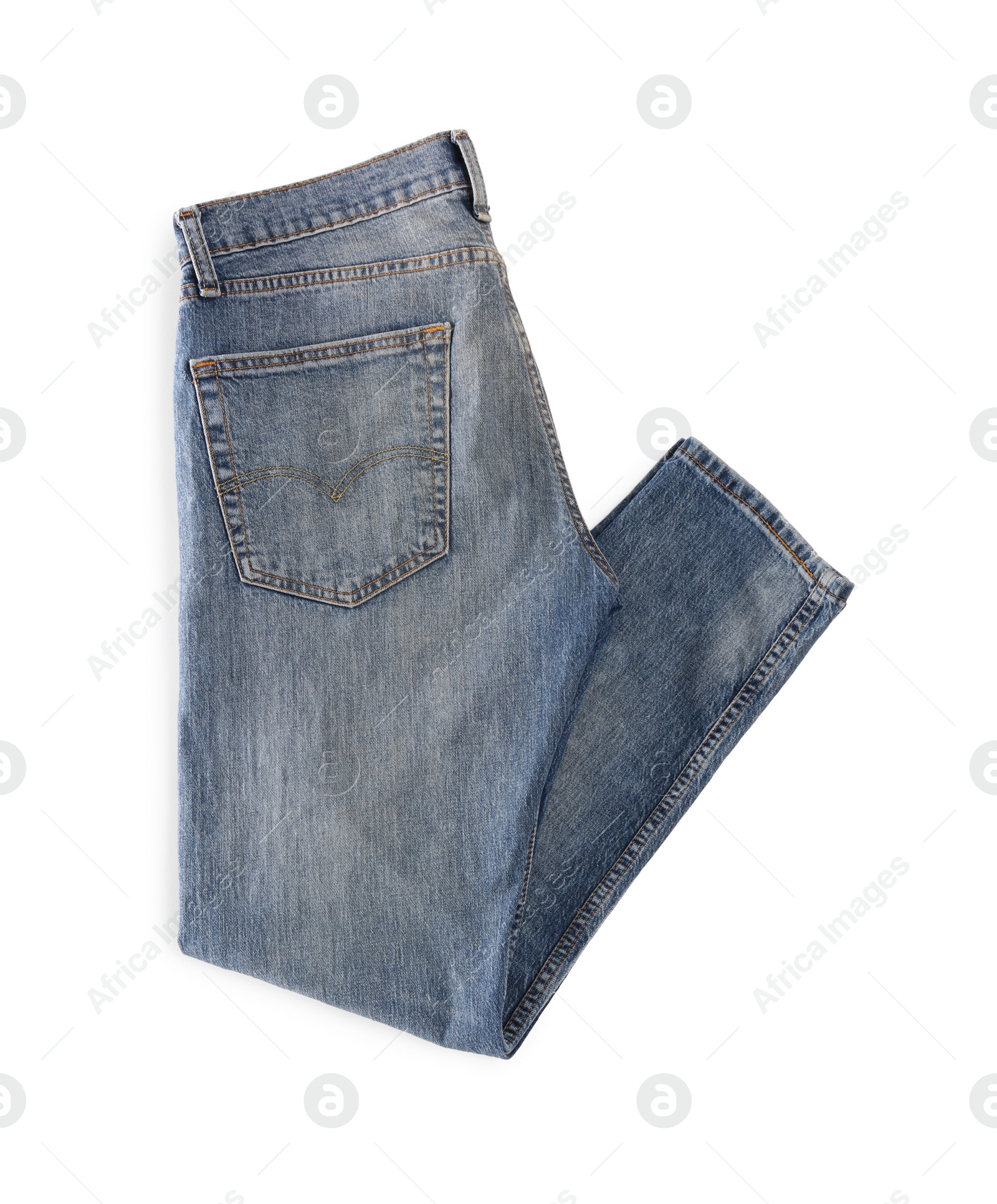 Photo of Blue jeans isolated on white, top view. Stylish clothes