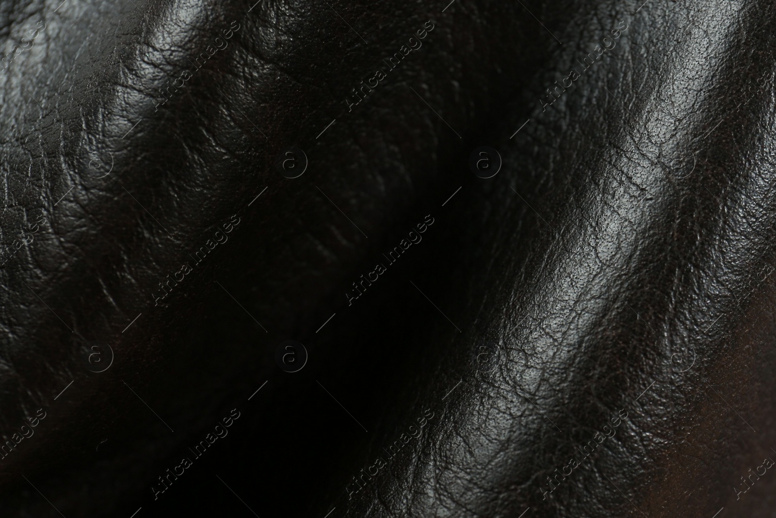 Photo of Texture of black leather as background, top view