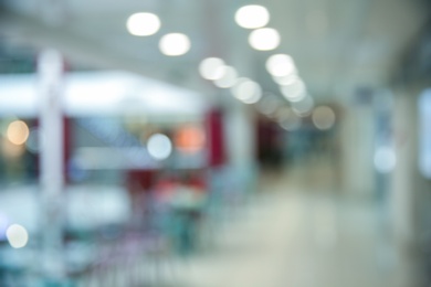 Blurred view of modern shopping mall interior