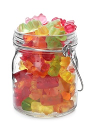 Photo of Glass jar with delicious jelly bears on white background