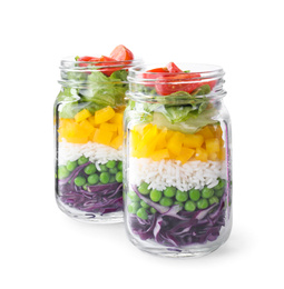 Photo of Healthy salad in glass jars isolated on white