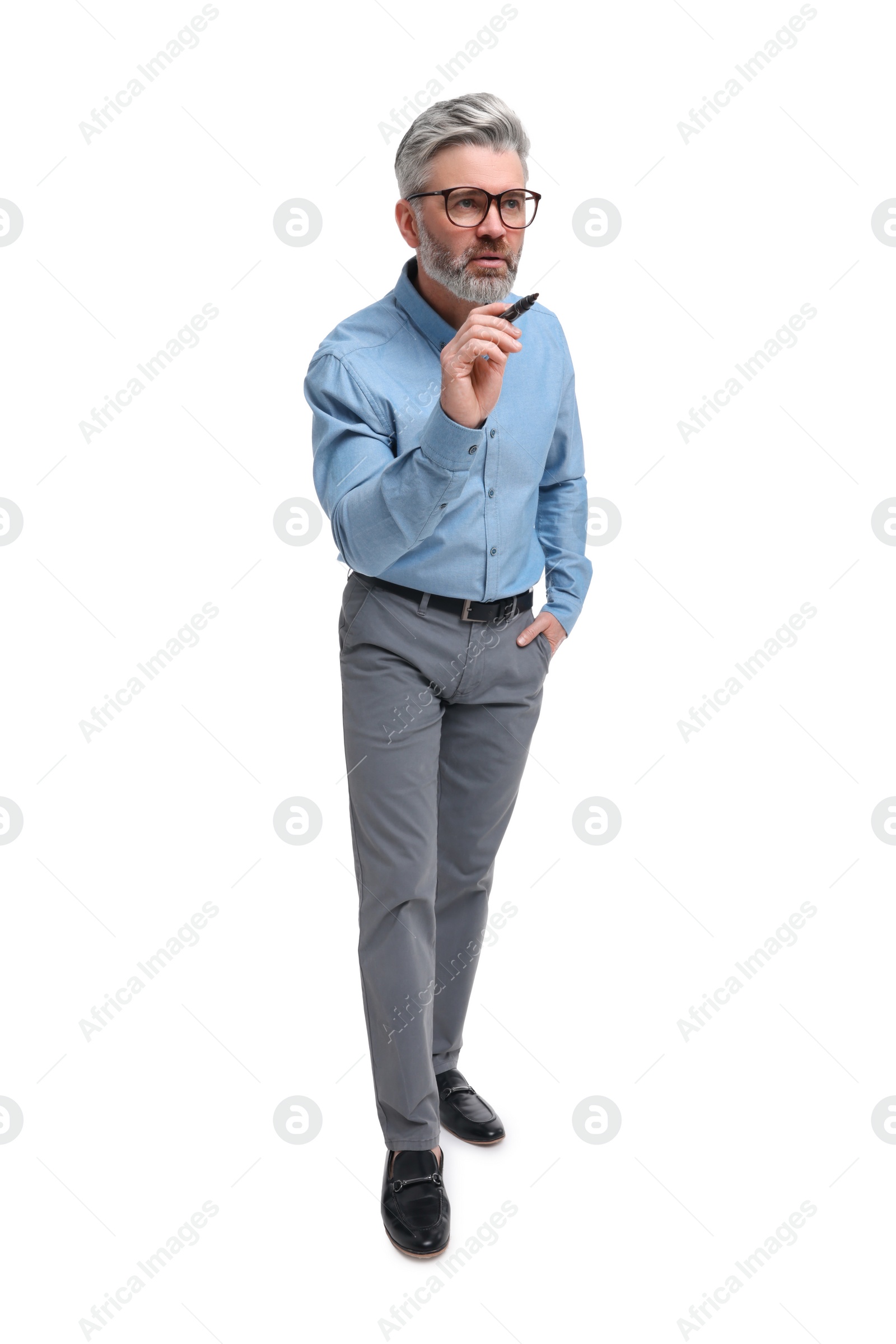 Photo of Mature businessman in stylish clothes posing on white background