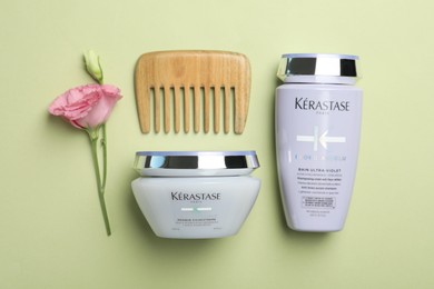 Photo of MYKOLAIV, UKRAINE - SEPTEMBER 07, 2021: Flat lay composition with Kerastase hair care cosmetic products on light green background