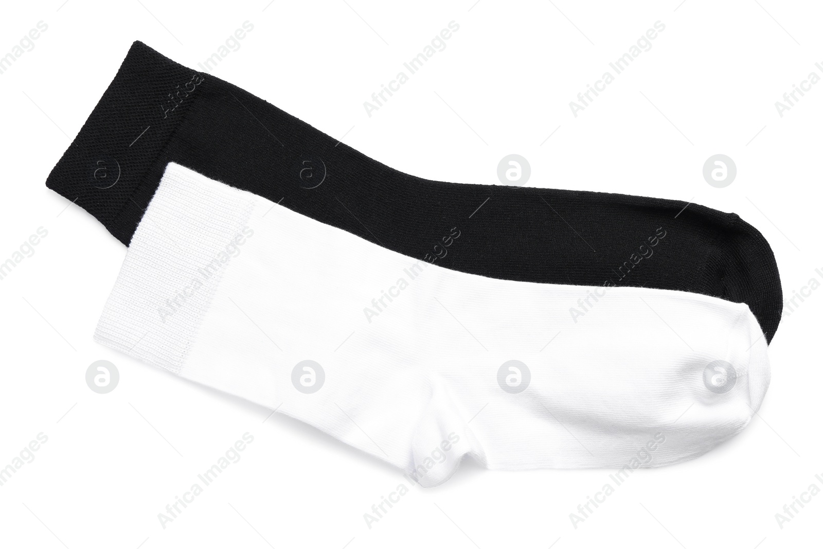 Photo of Different socks on white background, top view