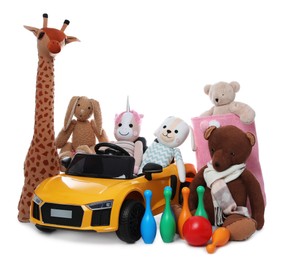 Child's electric car with other toys on white background