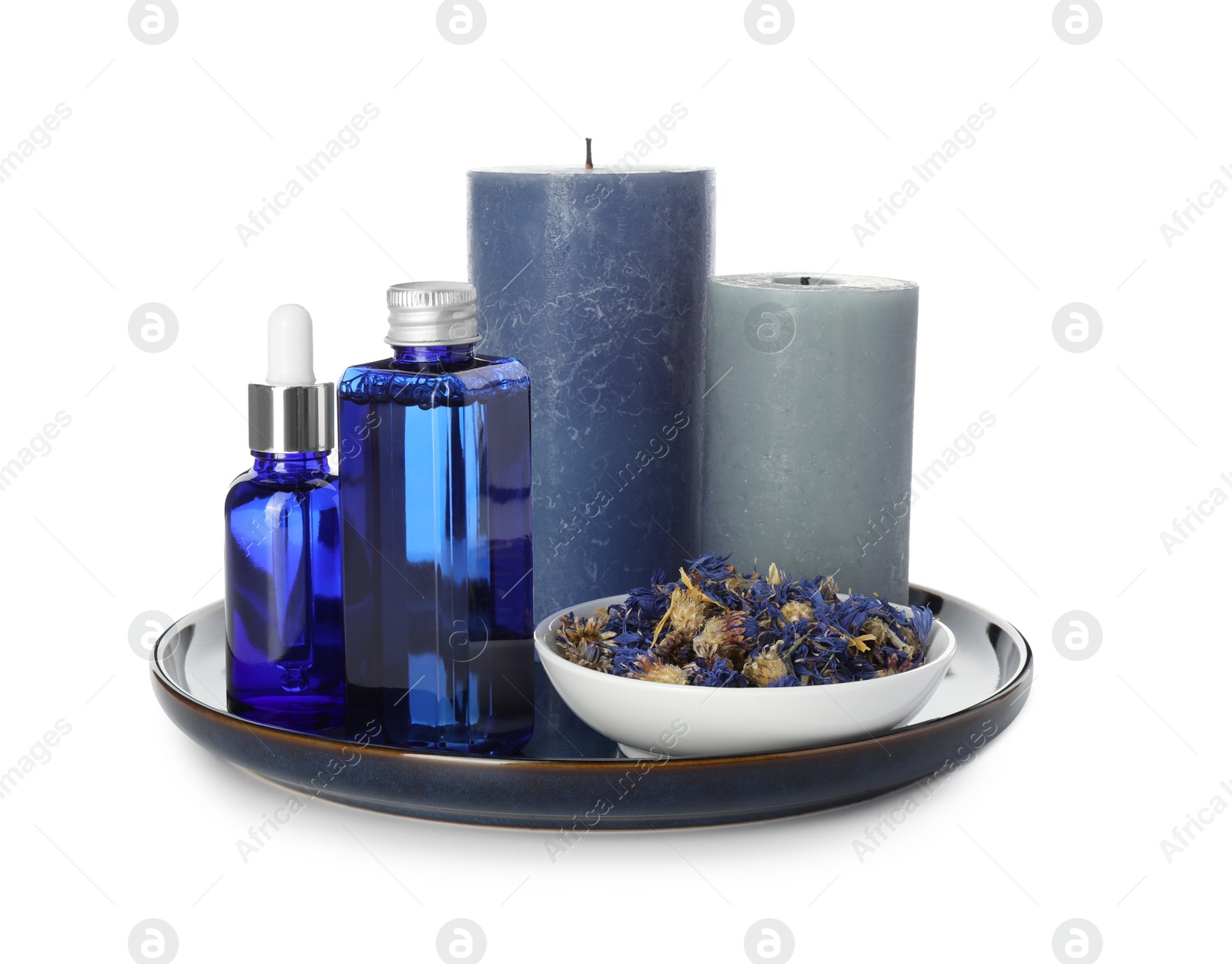 Photo of Spa composition. Cosmetic products, candles and dry flowers isolated on white