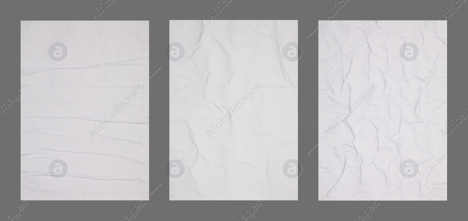 Image of Collection of creased blank posters on grey background. Banner design