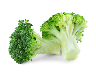 Photo of Fresh green broccoli isolated on white. Organic food