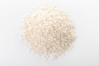 Photo of Raw rice on white background. Healthy grains and cereals