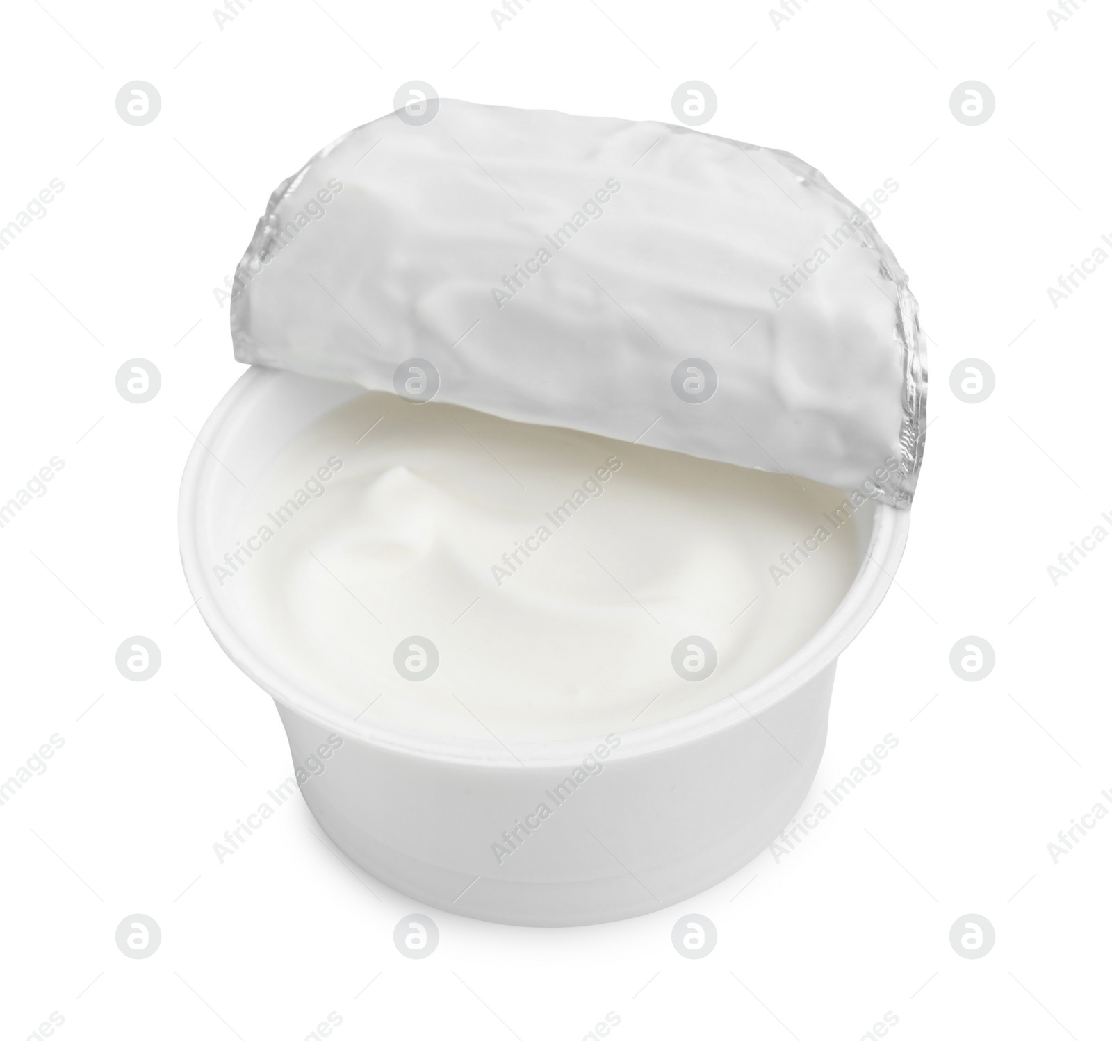 Photo of Delicious natural yogurt in plastic cup isolated on white