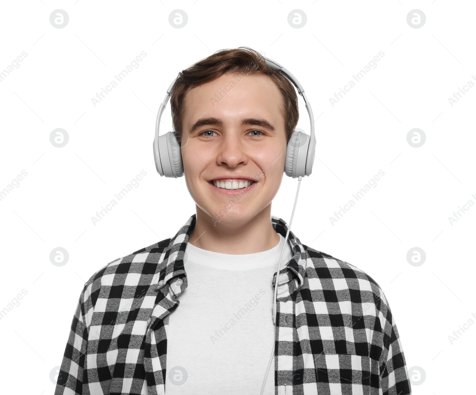 Photo of Handsome young man with headphones on white background