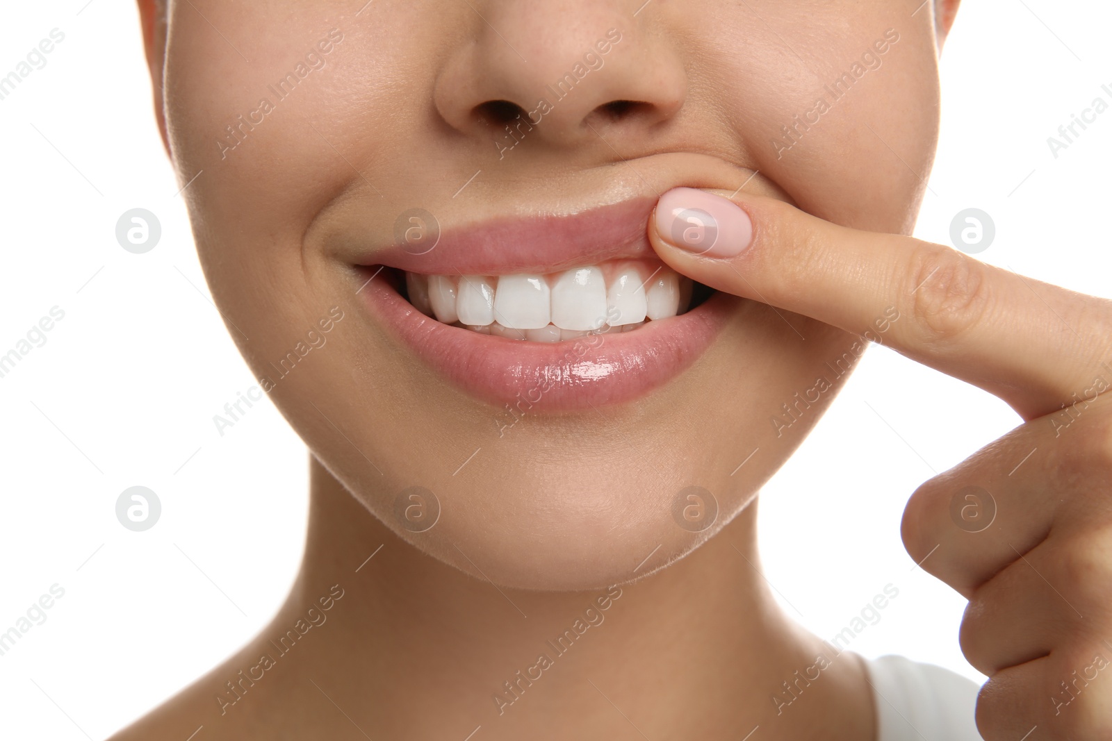 Photo of Young woman with healthy teeth on white background, closeup