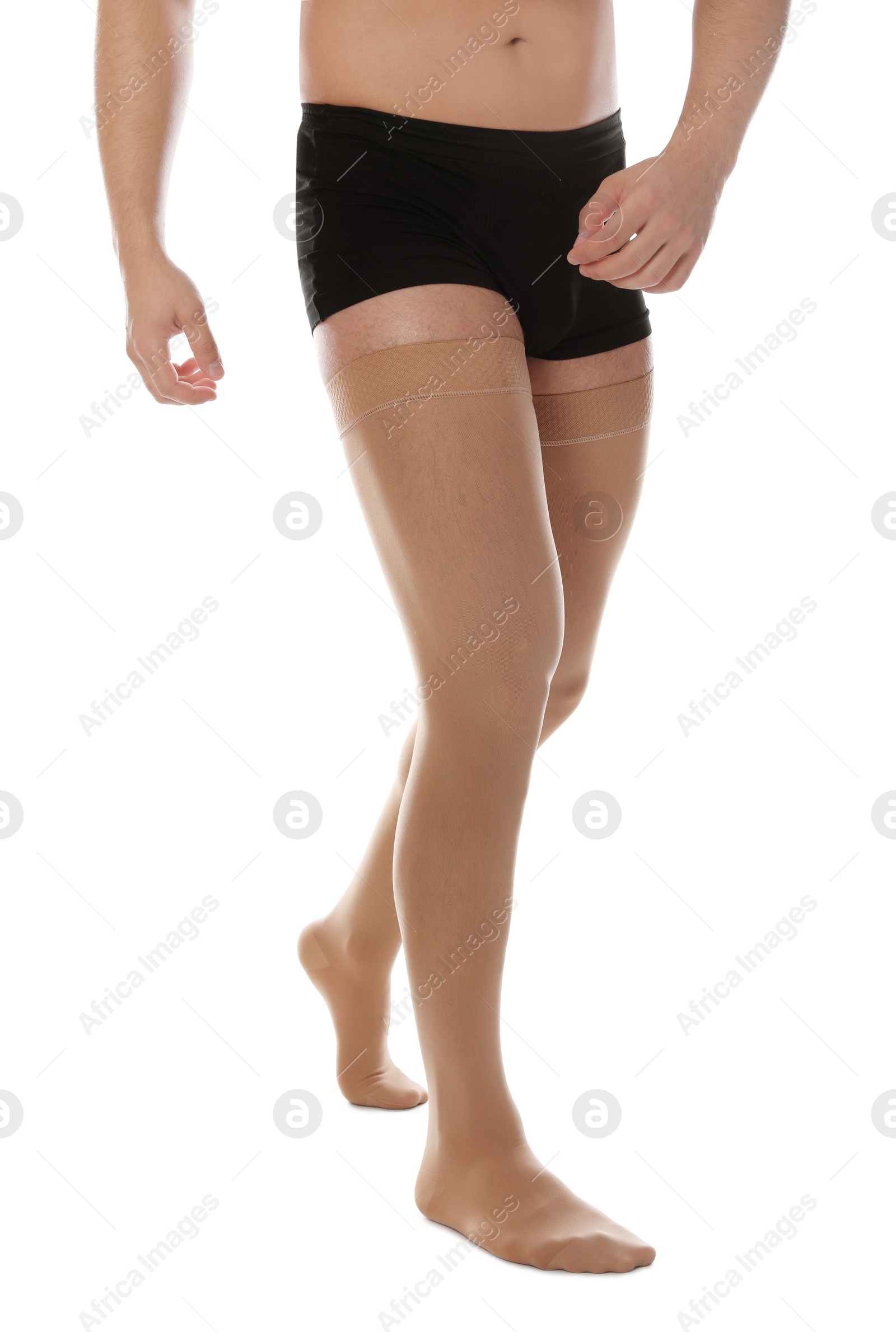 Photo of Man wearing compression stockings isolated on white, closeup