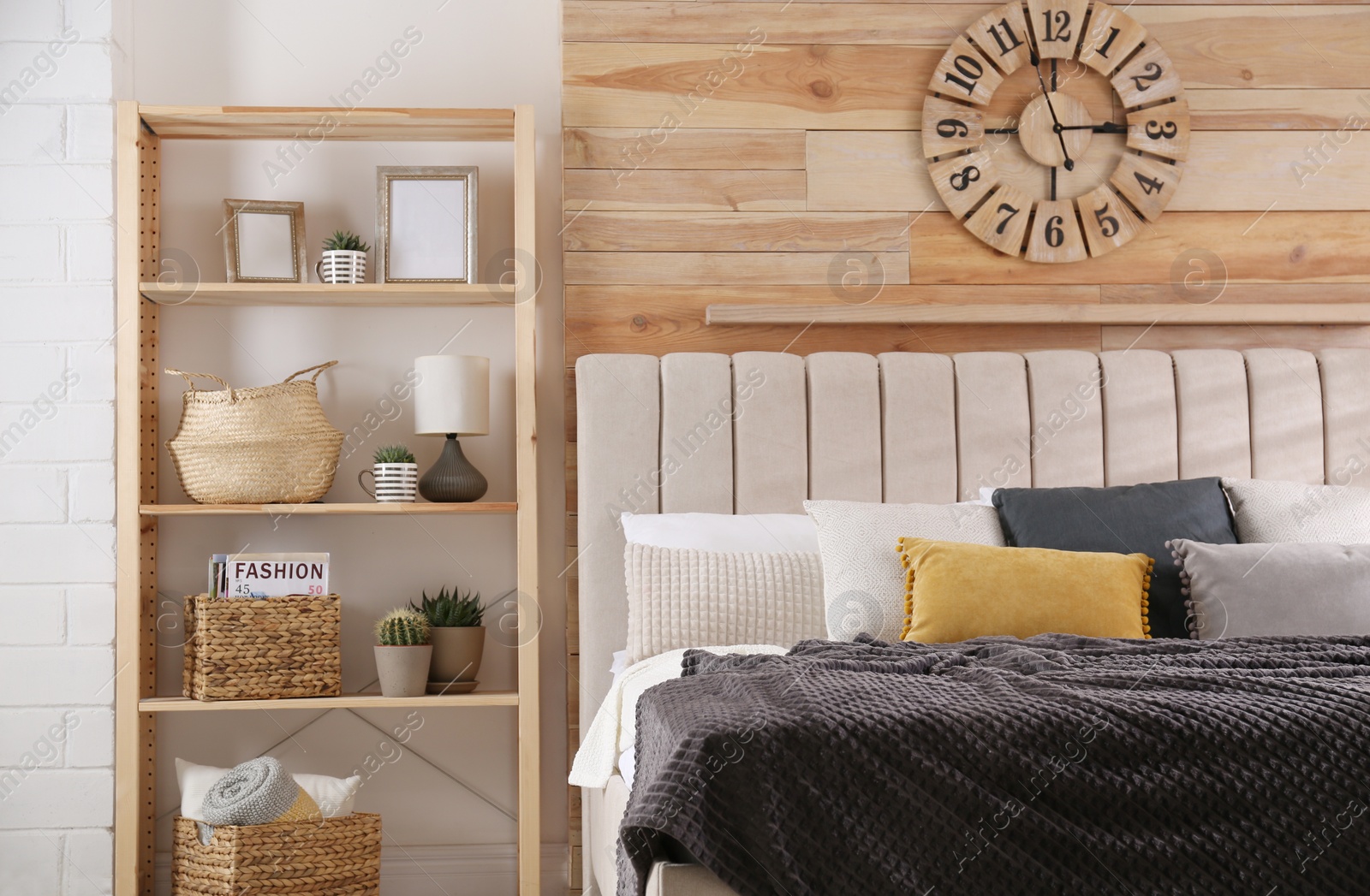 Photo of Comfortable bed with pillows in modern room interior