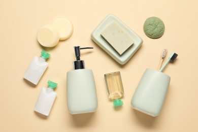 Photo of Bath accessories. Flat lay composition with personal care products on beige background