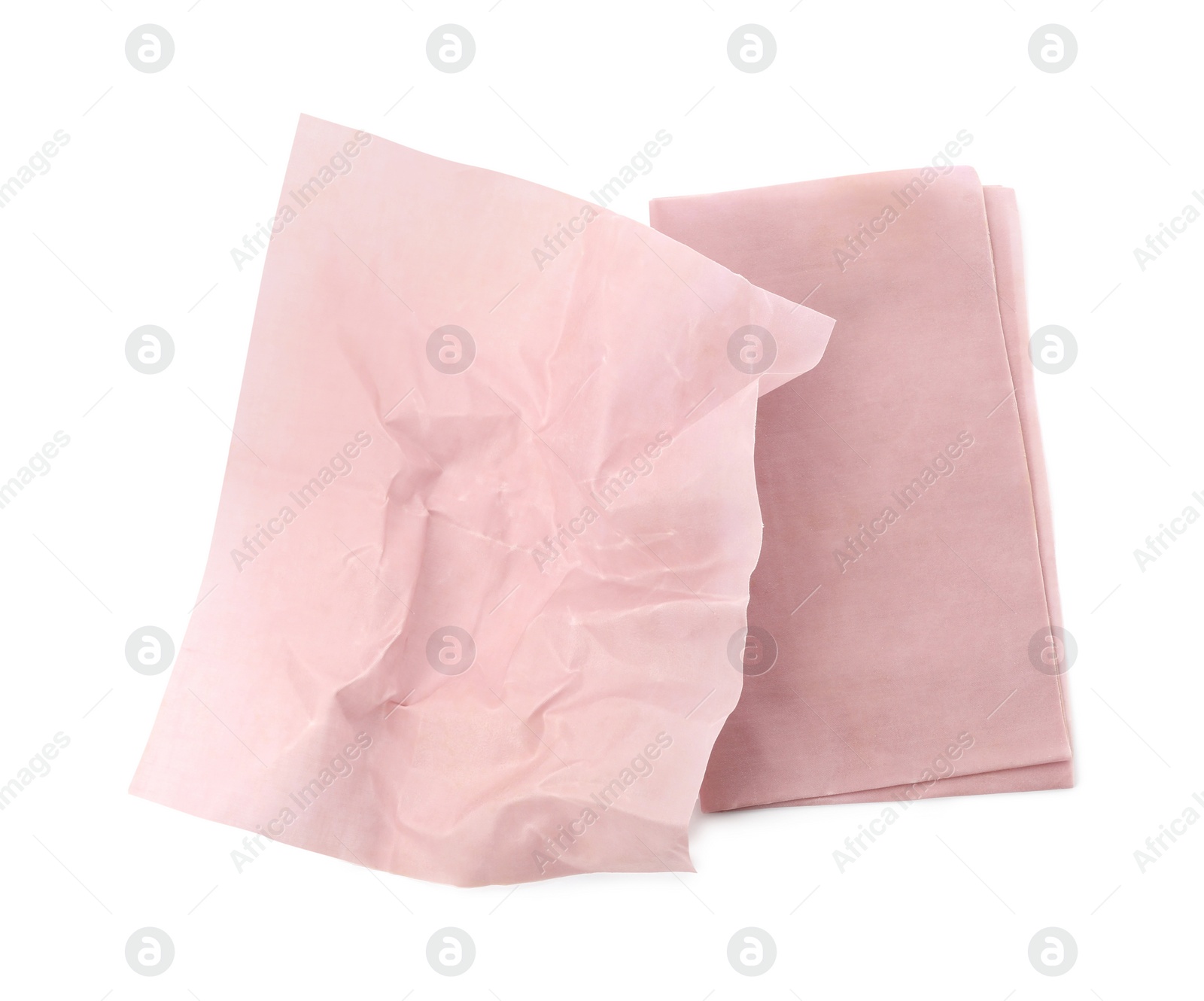 Photo of Pink reusable beeswax food wraps on white background, top view
