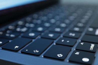 Photo of Keyboard of laptop, closeup view. Modern technology