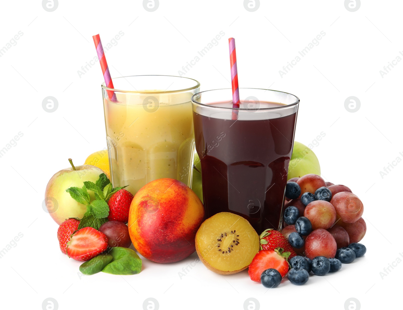 Photo of Glasses of delicious juices and fresh ingredients on white background