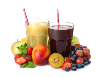 Glasses of delicious juices and fresh ingredients on white background