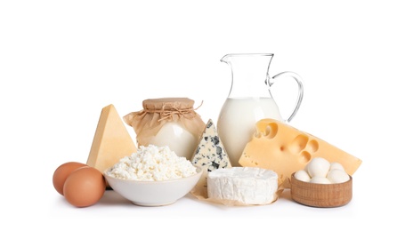 Photo of Set of different dairy products isolated on white