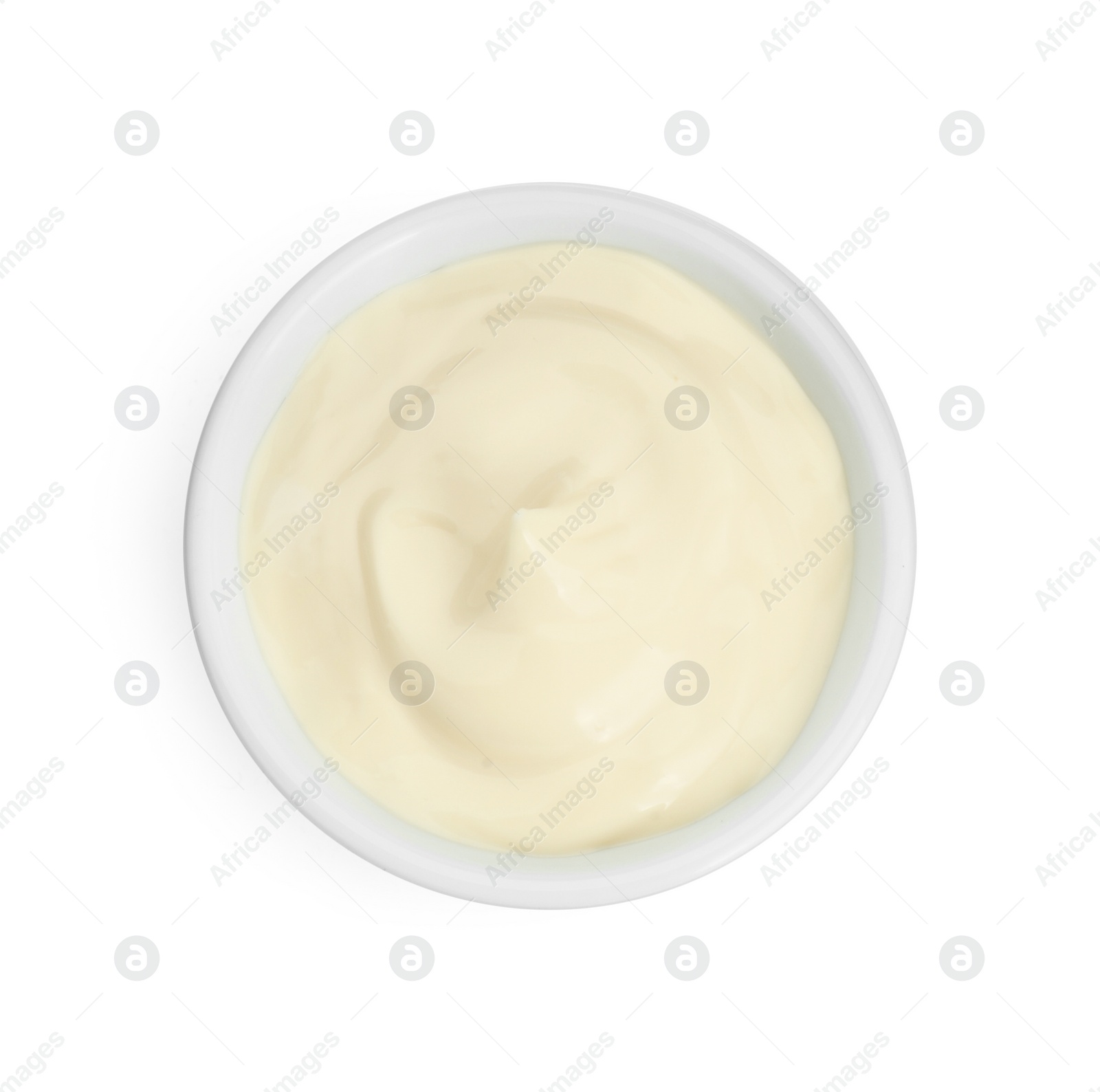 Photo of Fresh mayonnaise sauce in bowl isolated on white, top view