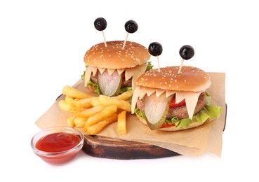 Cute monster burgers served with french fries and ketchup isolated on white. Halloween party food