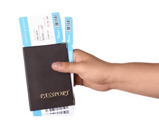 Woman holding passport and tickets on white background, closeup. Travel agency concept