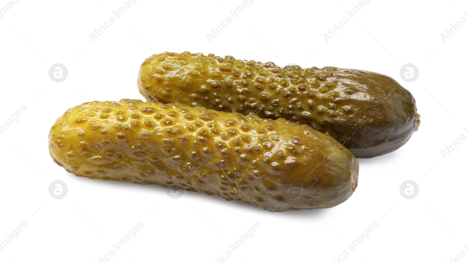 Photo of Two tasty pickled cucumbers isolated on white