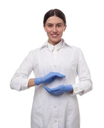 Photo of Doctor in coat holding something on white background