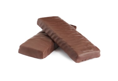 Photo of Tasty chocolate glazed protein bars on white background. Healthy snack