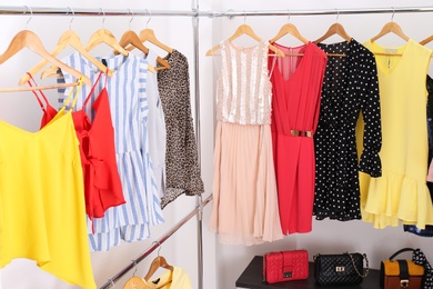 Photo of Modern dressing room with different stylish clothes and accessories