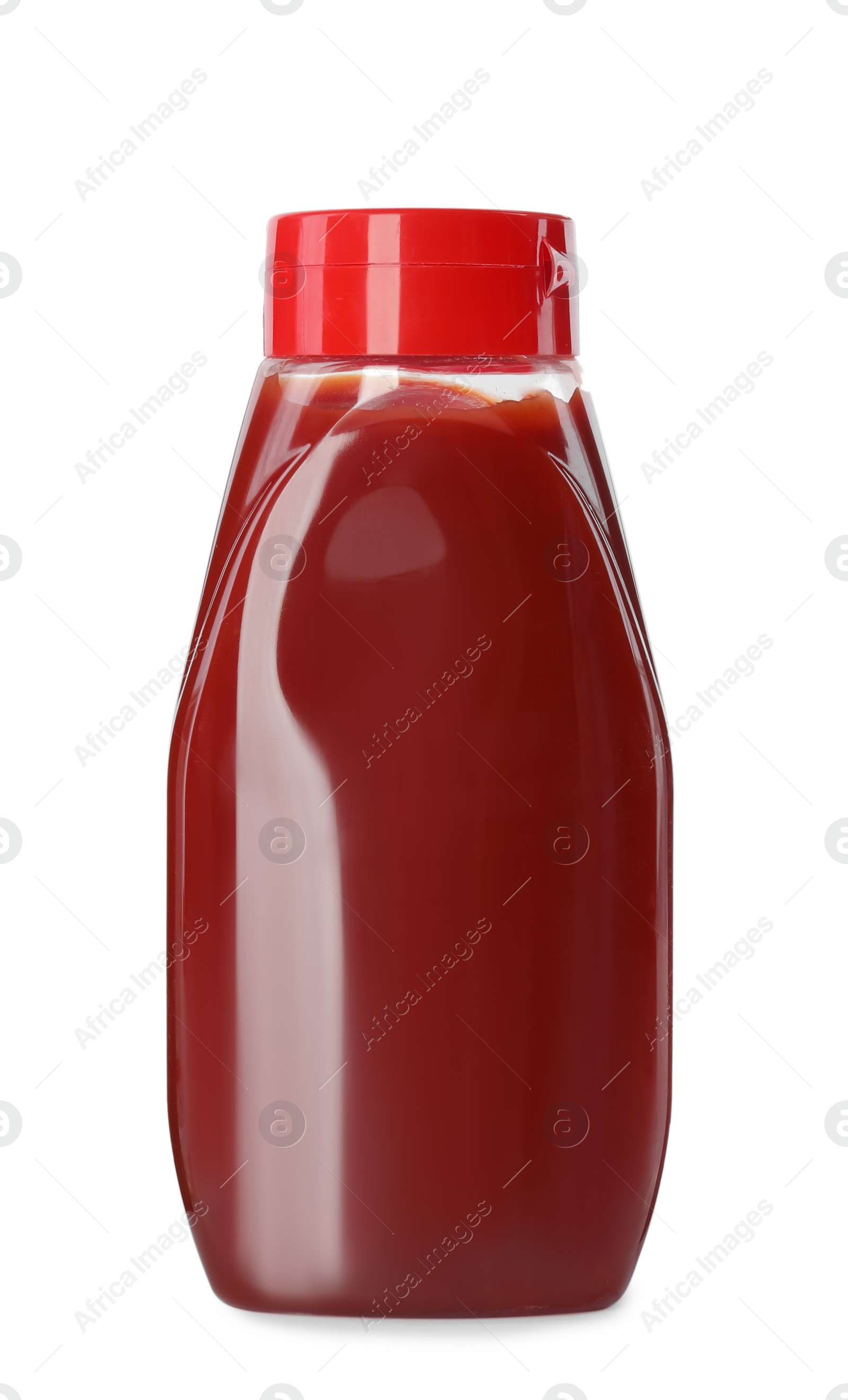 Photo of Plastic bottle of ketchup isolated on white