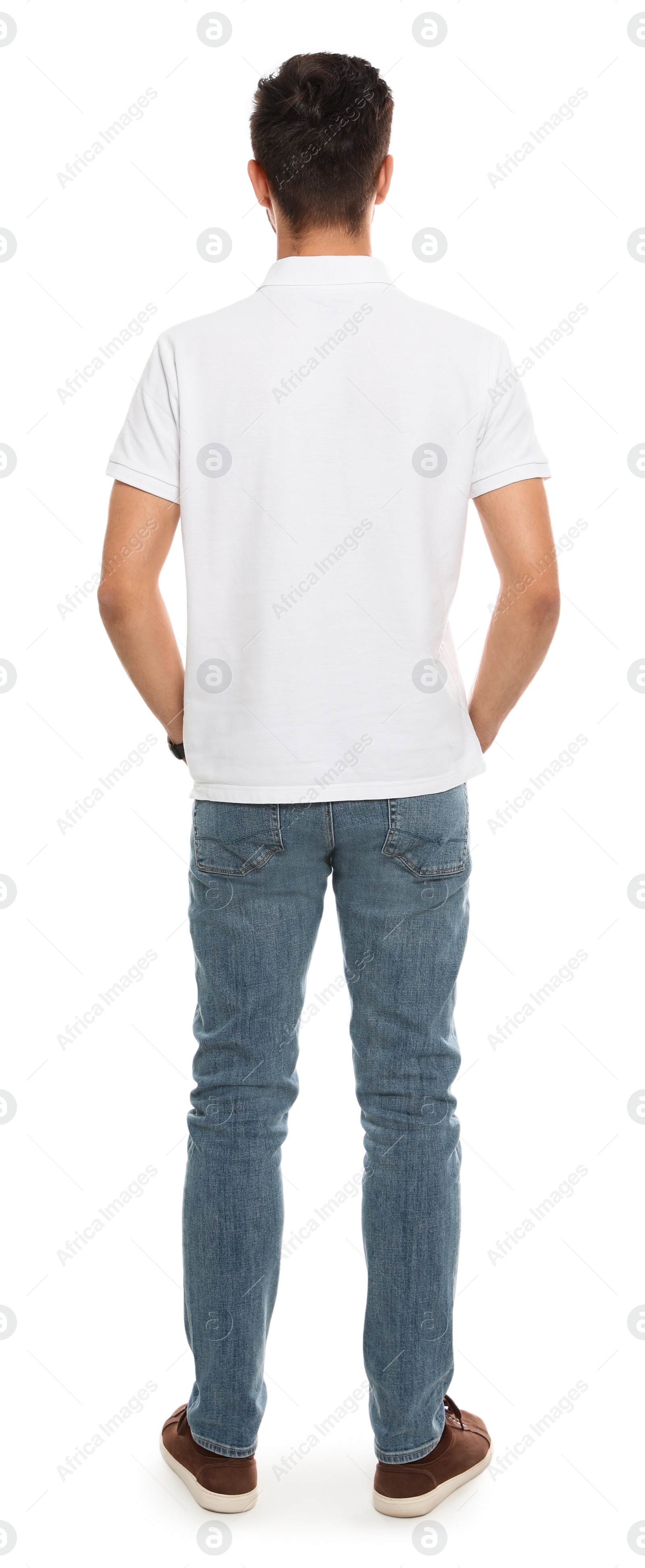 Photo of Young man in t-shirt on white background. Mock up for design