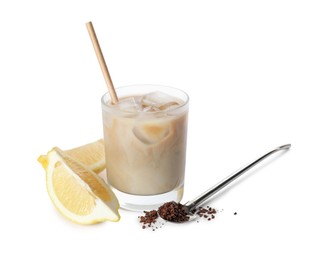 Photo of Iced coffee with milk in glass, cut lemon and instant coffee on white background