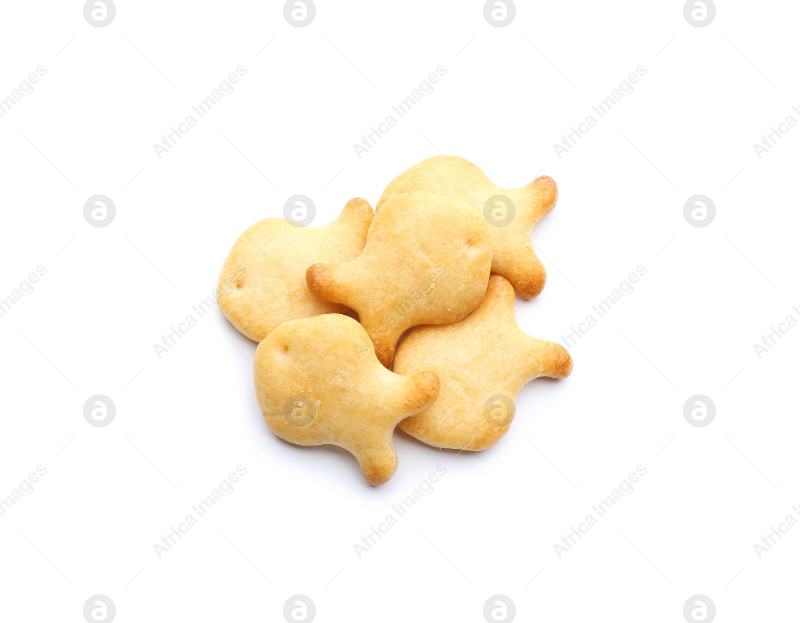 Photo of Delicious crispy goldfish crackers on white background, top view