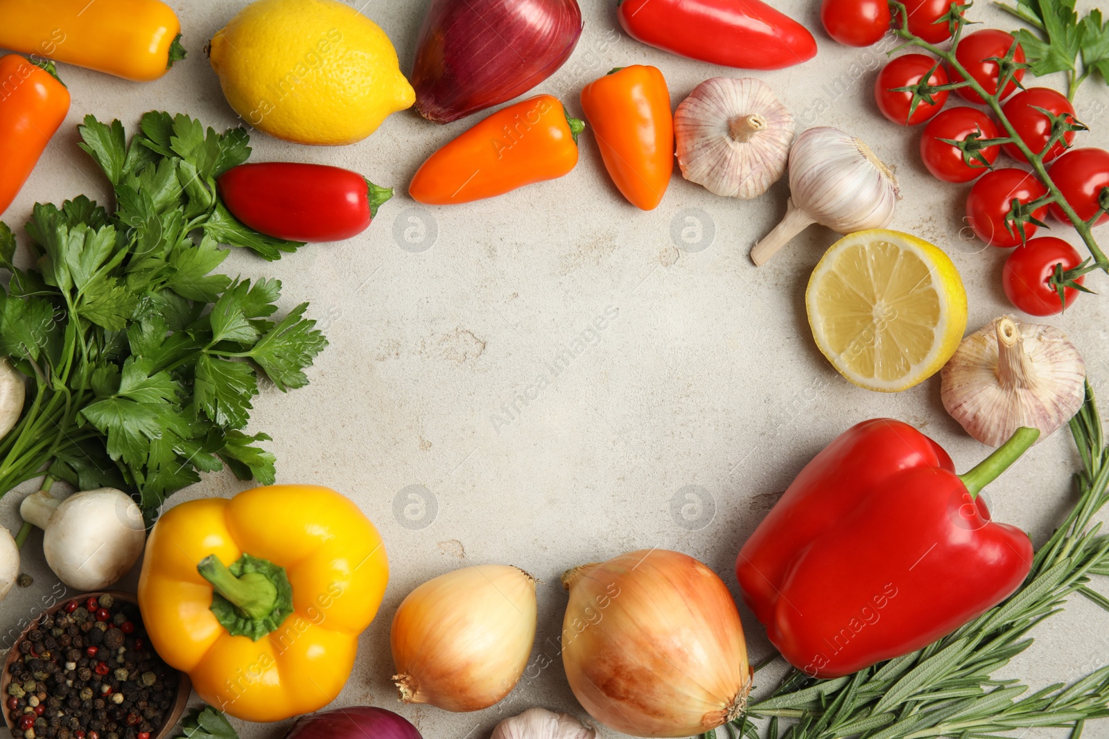 Photo of Frame of ingredients for cooking on light table, flat lay. Space for text