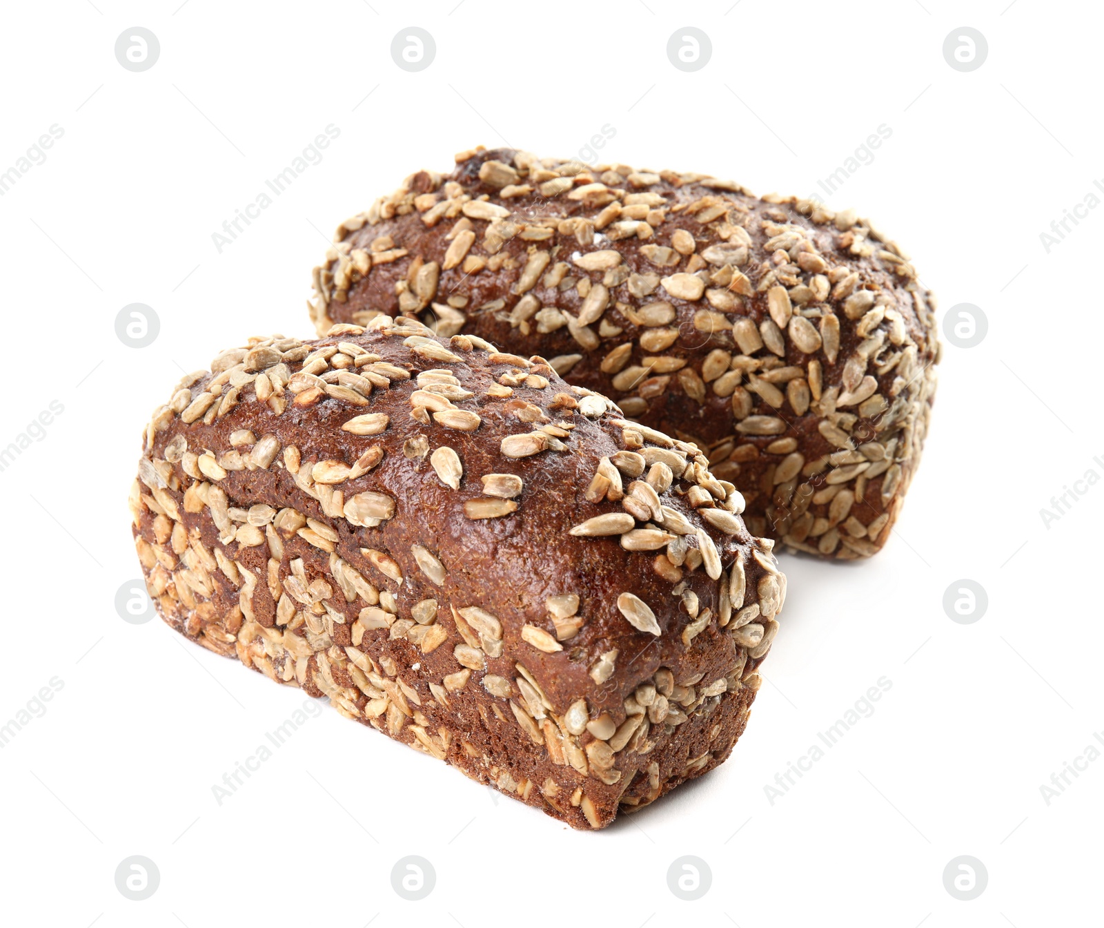 Photo of Loaves of rye bread with sunflower seeds isolated on white