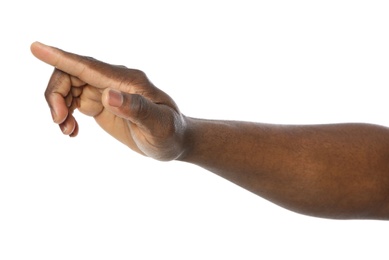 African-American man pointing at something on white background, closeup