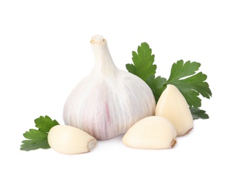 Photo of Fresh garlic bulb and cloves with parsley isolated on white. Organic food