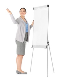 Photo of Business trainer giving presentation on flip chart board against white background