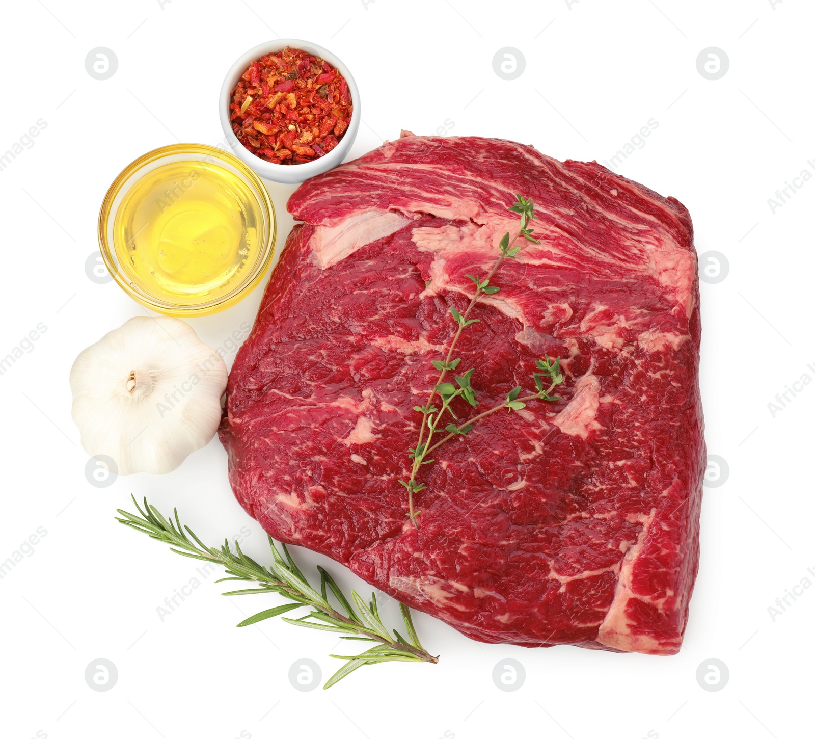 Photo of Fresh raw beef cut and products isolated on white, top view