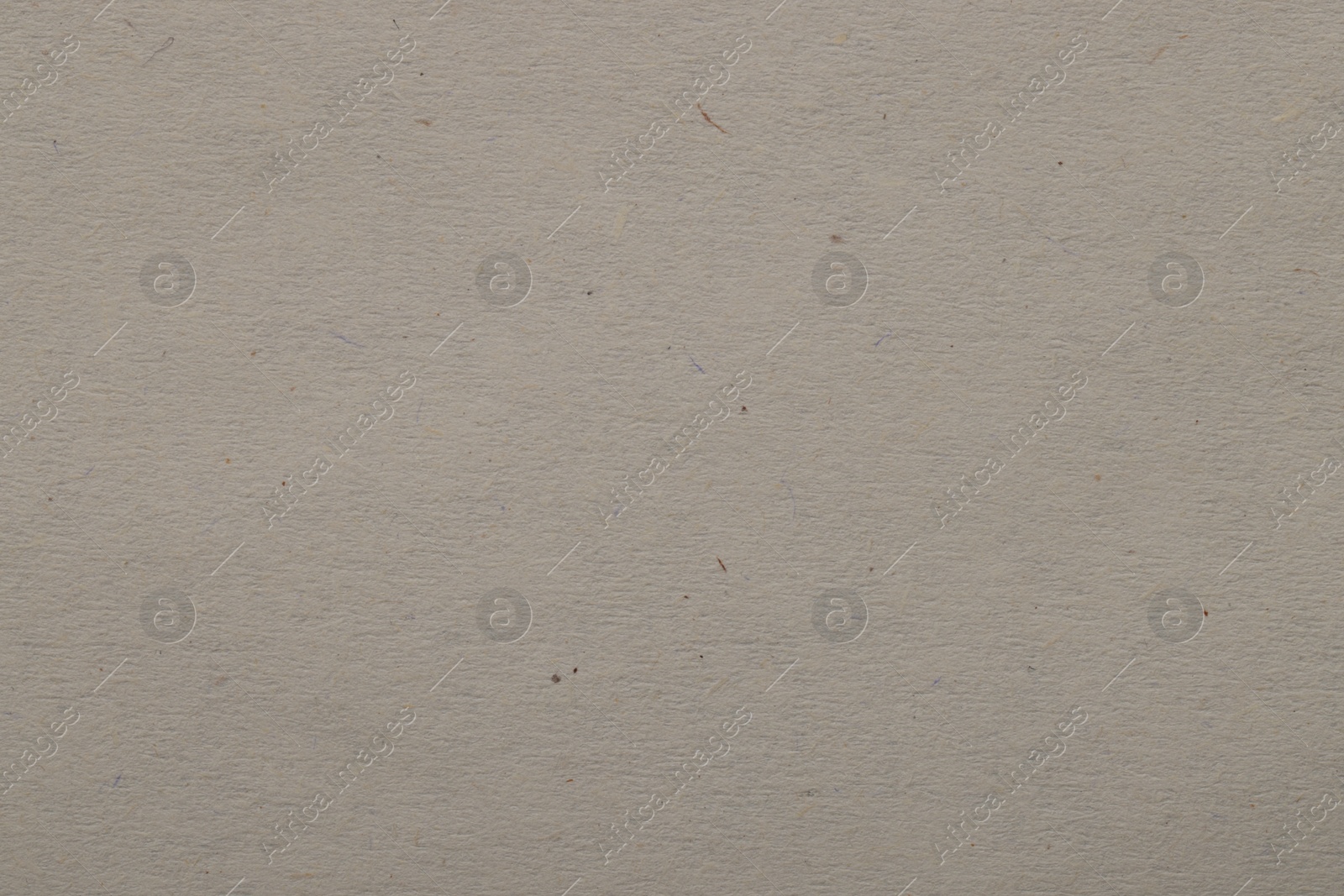 Photo of Texture of light grey paper sheet as background, top view